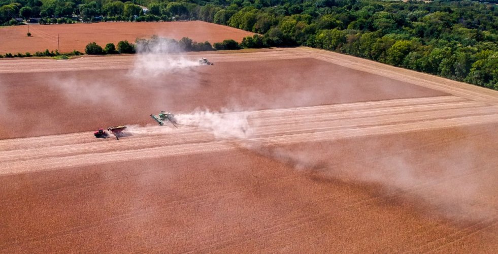 Soybean harvest Central Indiana. ( Sort of Landscape photos). Very dusty. Two combines will strip 110 acre field in 16 hours.